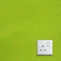 Green Energy in the Great Britain electrical socket Royalty Free Stock Photo