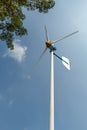 Green Energy Wind Turbine in running. Royalty Free Stock Photo