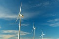 Green energy on wind turbines and wind turbines. Alternative energy sources and renewable energy sources. Power generation and Royalty Free Stock Photo