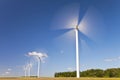 Green Energy Wind Turbines In Field of Sunflowers Royalty Free Stock Photo