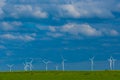 Green energy.Windmills set in a green field .Wind generator in green grass.renewable energy.Alternative energy sources Royalty Free Stock Photo