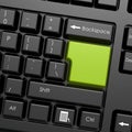 Green enter button in black keyboard Royalty Free Stock Photo