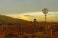 Green environment wind mill sunset sky landscape Royalty Free Stock Photo