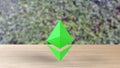 Green Ethereum gold sign icon on wood table on leaves background. 3d render isolated illustration, cryptocurrency, crypto,