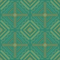 Green ethnic pattern with geometric ethnic seamless square in for fabric pattern