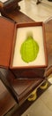 A green Etrog with Leather box