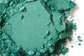 Green eye shadow crushed macro on white Royalty Free Stock Photo