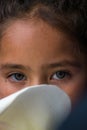 Green eyes and flower Colombian Boyaca girl Royalty Free Stock Photo