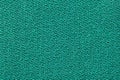 Green fabric background texture. Detail of textile material close-up Royalty Free Stock Photo