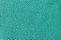 Green fabric background texture. Detail of textile material close-up Royalty Free Stock Photo