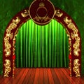 Green fabric curtain with gold on stage