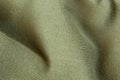 Green fabric dress as background macro photo Royalty Free Stock Photo