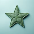 Green Fabric Star On Blue Background Stock Photo