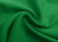 Green fabric surface texture. Matted fabric background