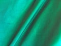 Green fabric texture background with copy space for work and design, top view Royalty Free Stock Photo