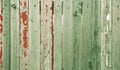 Green Faded Wooden Fence. Old Weathered Wood Planks Royalty Free Stock Photo