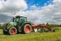 A farm tractor with rota rake ready to make silage Royalty Free Stock Photo