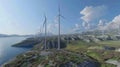 Green field and hills landscape with wind turbines in a sunny day with blue sky and puffy clouds Royalty Free Stock Photo