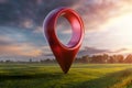 Green field and sunset with destination big red pin location. Concept of goal, dream, end, picnic, victory. mixed media Royalty Free Stock Photo