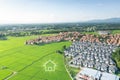 Green fields and dream house in aerial view Royalty Free Stock Photo