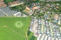 Green fields and dream house in aerial view Royalty Free Stock Photo