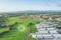 Green fields and dream house in aerial view Royalty Free Stock Photo