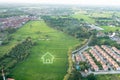 Green fields and dream house in aerial view Royalty Free Stock Photo