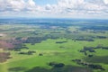 Green fields and forests, blue sky and white clouds background panoramic  aerial view, sunny summer day europe nature landscape Royalty Free Stock Photo