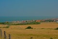 Green fields and small village on the French Opal North Sea coast