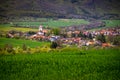 Green Fields of Spring: Church on the Horizon Underneath a Blue SkyRural Agricultural Landscape Royalty Free Stock Photo