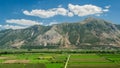 Green Fields Under Mountains