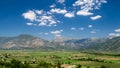 Green Fields Under Mountains