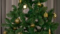 Green fir-tree with golden decoration rotate. Tamplate for greeting card to celebrate Merry Christmas and Happy New Year