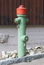 Green fire hydrant on a city sidewalk Royalty Free Stock Photo