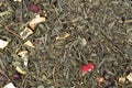 Green flavored tea based on tea Sencha with strawberry, cranberry.