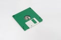 Green floppy disk (back side) on white background. Royalty Free Stock Photo