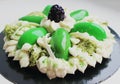 Green flower cake with cream, microwave pistachio sponge and blackberry