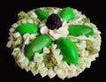 Green flower cake with cream, microwave pistachio sponge and blackberry on black