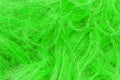 Green fluffy wool texture, animal wool background, painted fur texture closeup Royalty Free Stock Photo