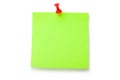 Green fluorescent sticker on red thumbtack