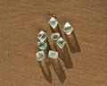 Green Fluorite Natural Octahedron Crystals on the beach