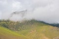 Green Foggy Mountain Landscape of the HImalayas in Kagbeni of Upper Mustang, Nepal Royalty Free Stock Photo