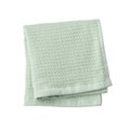 Green folded bath towel isolated on white background, top view Royalty Free Stock Photo