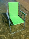 Green folding camp chair Royalty Free Stock Photo