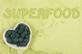 Green food supplement background. Royalty Free Stock Photo