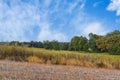 Green forest blue sky and part of agriculture field Royalty Free Stock Photo