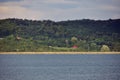 Green forest reflected in the lake in summer Royalty Free Stock Photo