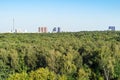 Green forest and residential district on horizon Royalty Free Stock Photo