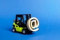 Green Forklift truck carry email symbol commercial AT. Integration of the industry into network technologies and Internet. Royalty Free Stock Photo