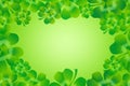 Green four leaf clover / shamrock border frame background